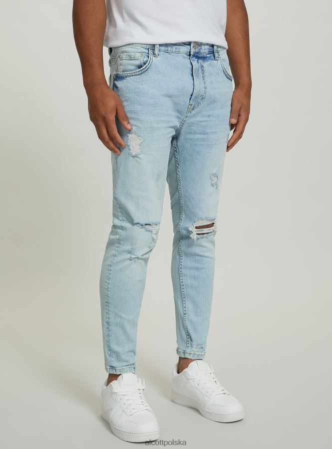 odzież Alcott Dżinsy ze stretchem typu carrot fit z przetarciami d004 średni jasnoniebieski mężczyźni 2TXFF6998