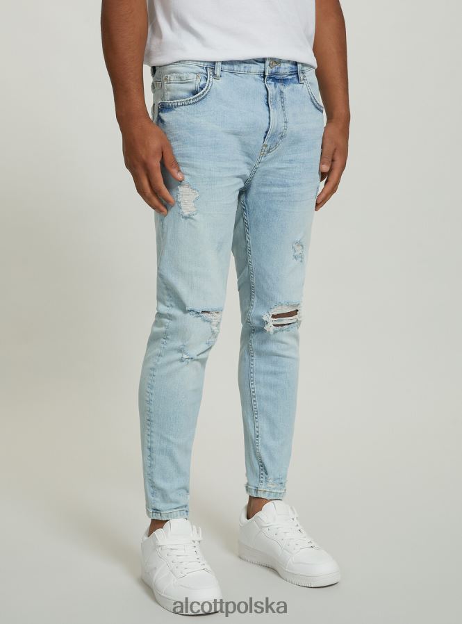 odzież Alcott Dżinsy ze stretchem typu carrot fit z przetarciami d004 średni jasnoniebieski mężczyźni 2TXFF6998