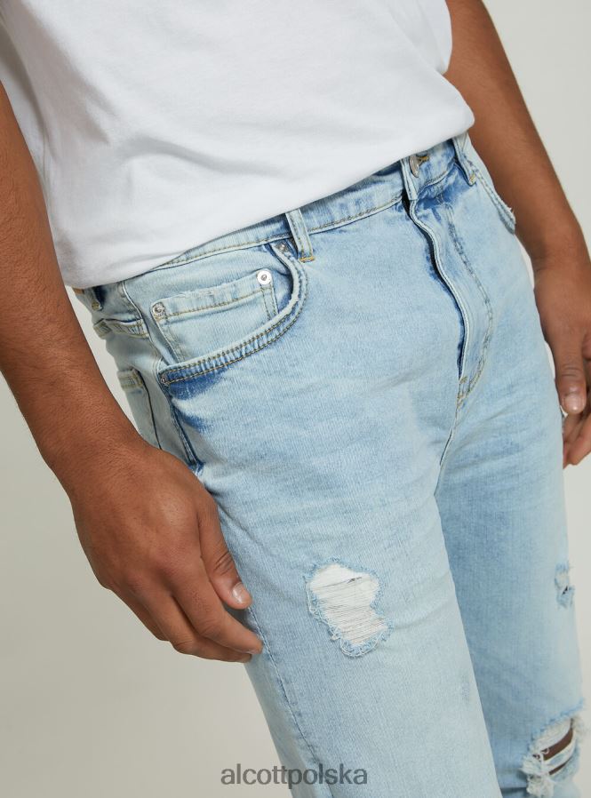 odzież Alcott Dżinsy ze stretchem typu carrot fit z przetarciami d004 średni jasnoniebieski mężczyźni 2TXFF6998